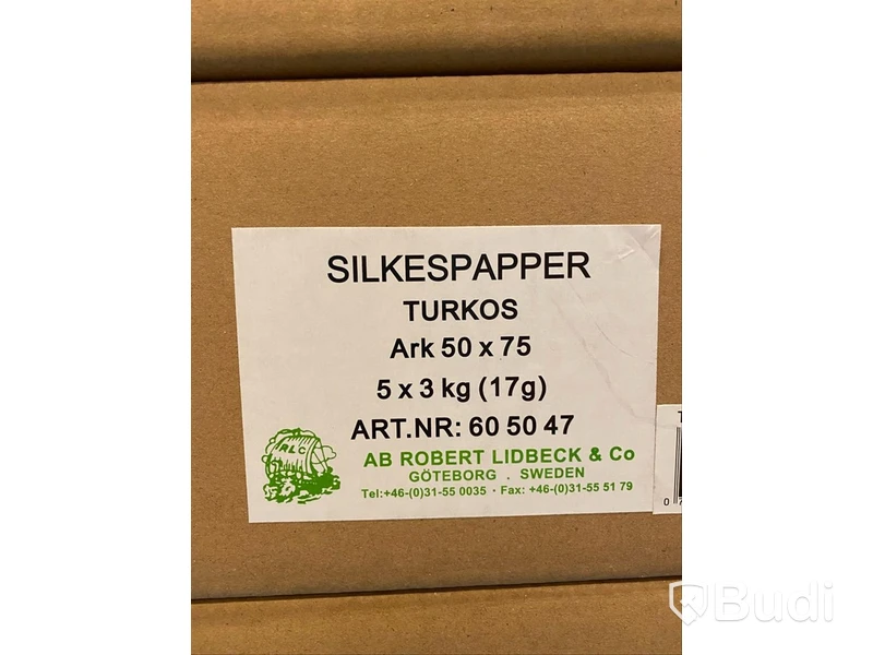 16 lådor med silkespapper i turkos färg